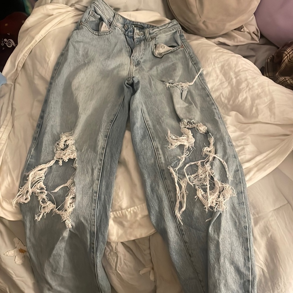 blue ripped jeans